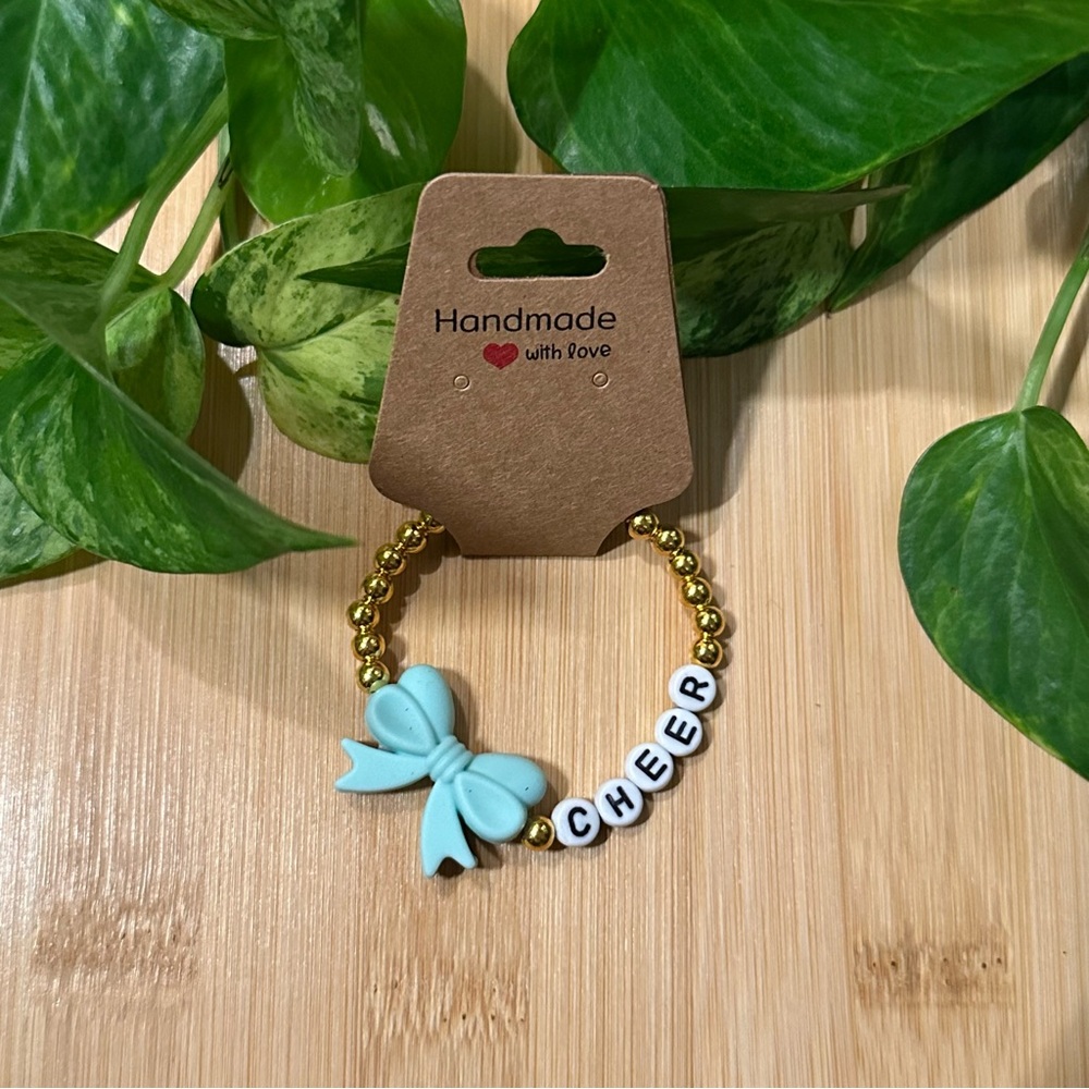 Gold Kids’ Stretchy Beaded Cheer Bracelet | Handmade‎ | Silicone Bow 📣✨ - Picture 1 of 1